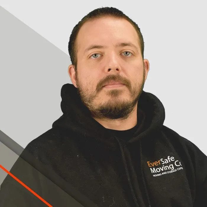 Chris, Mover, wearing an EverSafe uniform and ready for the next job