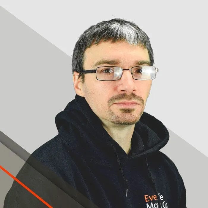 Drew, Crew Manager, wearing an EverSafe hoodie stares seriously into the camera