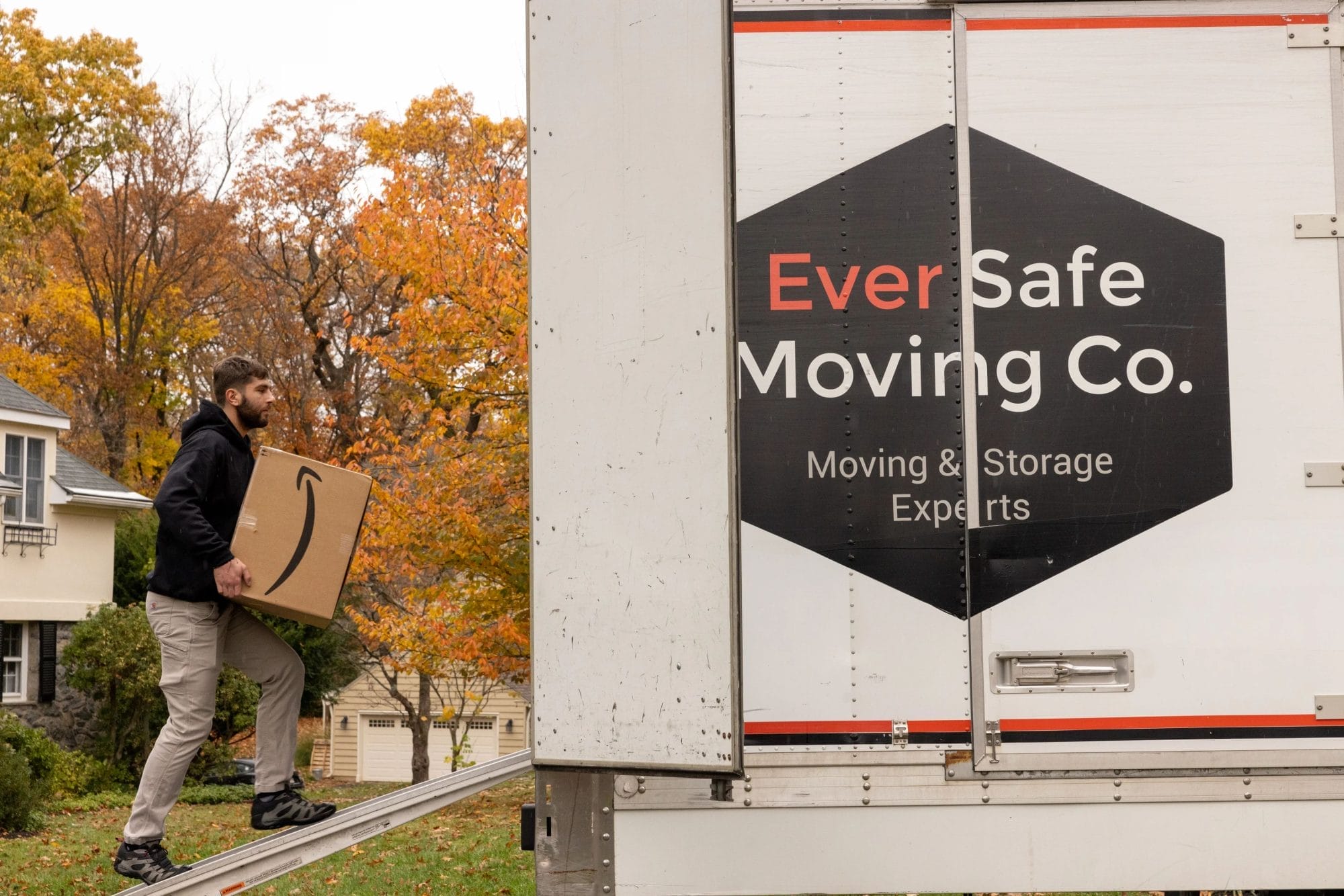 Close-up of Eversafe movers loading boxes onto an Eversafe truck